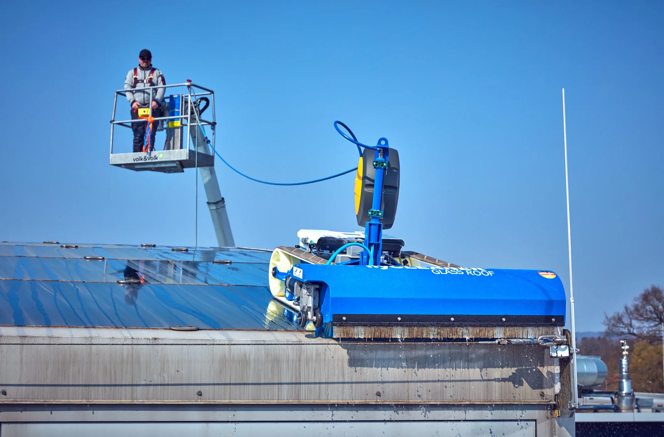 glass roof with operator cleaning